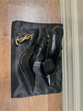 Saint Laurent Black Patent Slingback Heels with Gold Logo